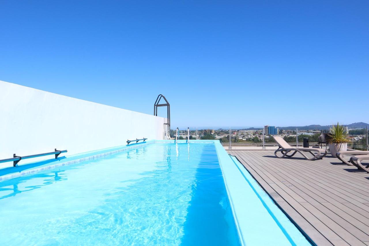 Hotel Wyndham Concepcion Pettra Exterior foto Rooftop pool