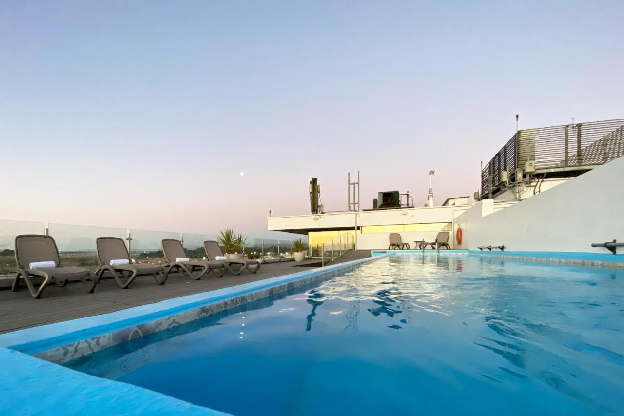 Hotel Wyndham Concepcion Pettra Exterior foto Rooftop pool